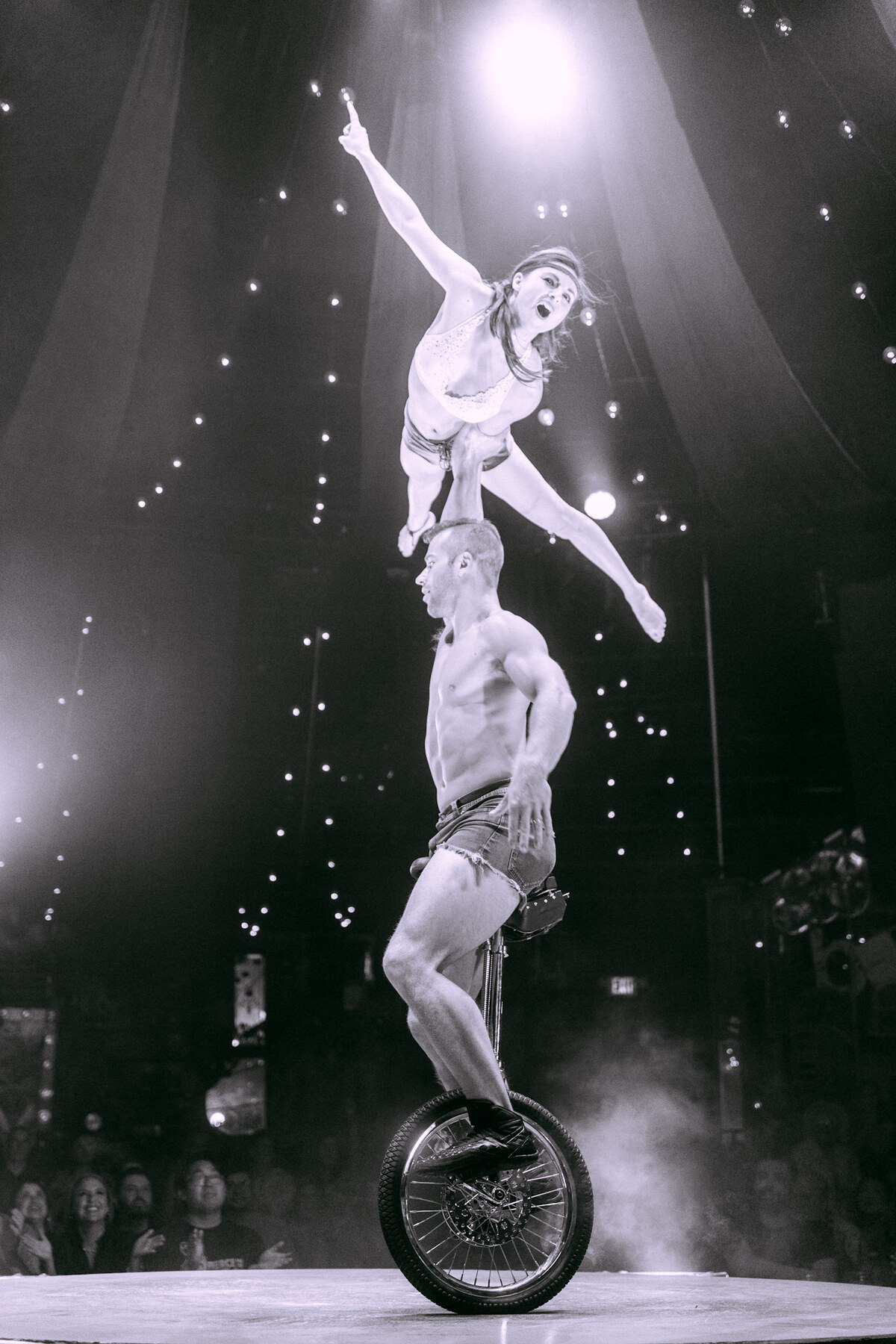 Philippe and Marie-Lee performing their duo unicycle act in ABSINTHE